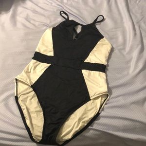 Blk & wht low cut front & back Chris cross 1 piece